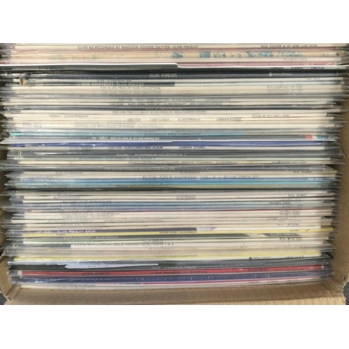 445 - Two boxes containing a large collection of Elvis Presley LPs.