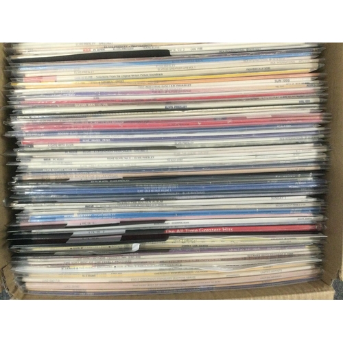 445 - Two boxes containing a large collection of Elvis Presley LPs.