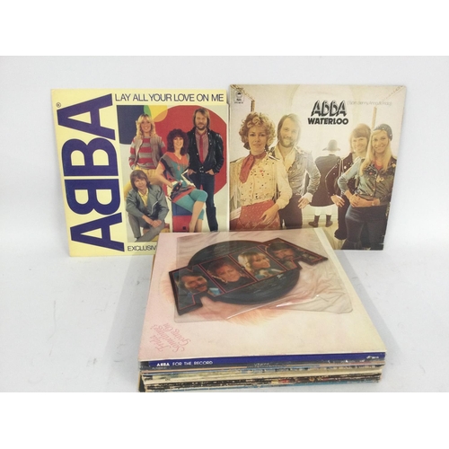 468 - A collection of Abba LPs, 12inch singles and a CBS promotional pack of the group.