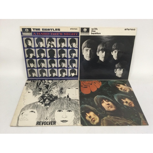 472 - Four Beatles LPs comprising 'Rubber Soul', 'Revolver', 'With The Beatles' and 'A Hard Day's Night'.