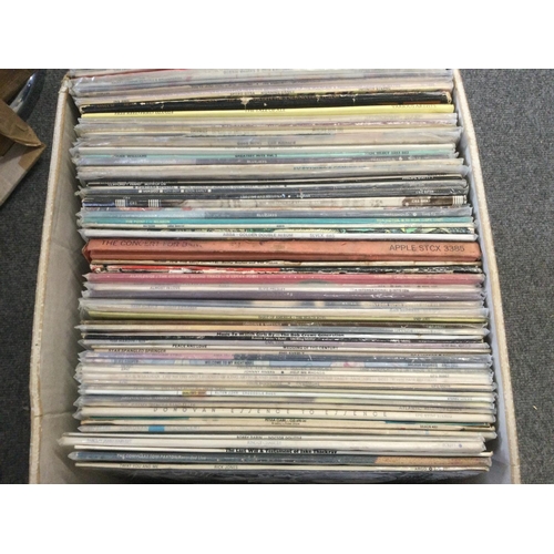 489 - A box of LPs by various artists including George Harrison, Leonard Cohen, Donovan and others.