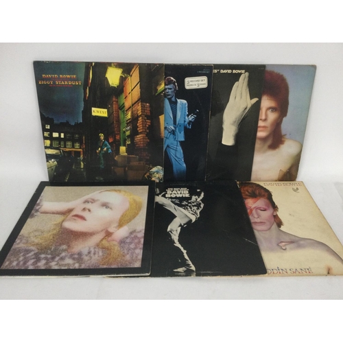 498 - A collection in two bags of 15 David Bowie LPs including 'Aladdin Sane', 'Ziggy Stardust', 'Diamond ... 