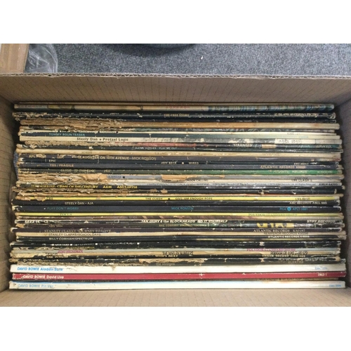 502 - A box of 1970s rock LPs by various artists including Jimi Hendrix, David Bowie, Jeff Beck and others... 