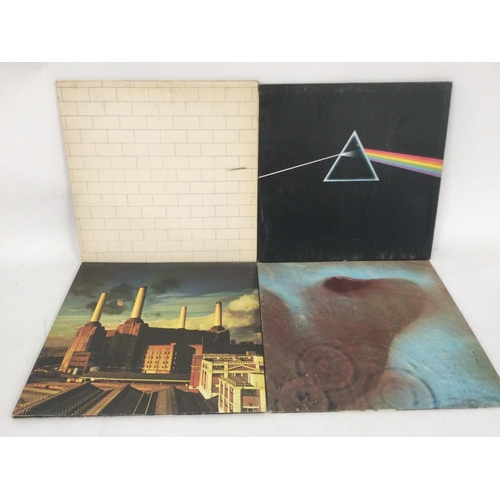 510 - Four Pink Floyd LPs comprising 'The Wall', 'Dark Side Of The Moon', 'Animals' and 'Meddle'.