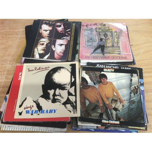 517 - A collection of 7inch singles by various artists mainly from the 1980s, plus some empty sleeves (pic... 