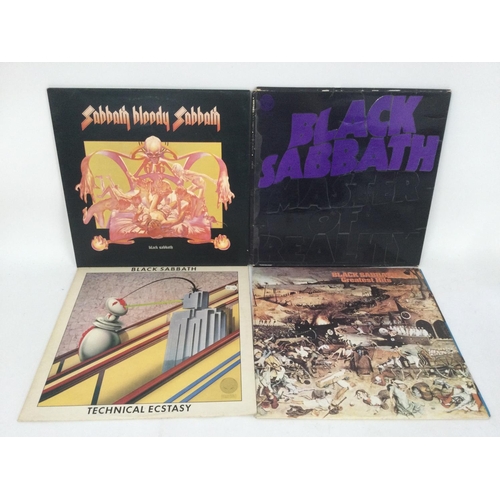 527 - Four Black Sabbath LPs including a first UK pressing of 'Master Of Reality', 'Technical Ecstasy', 'S... 