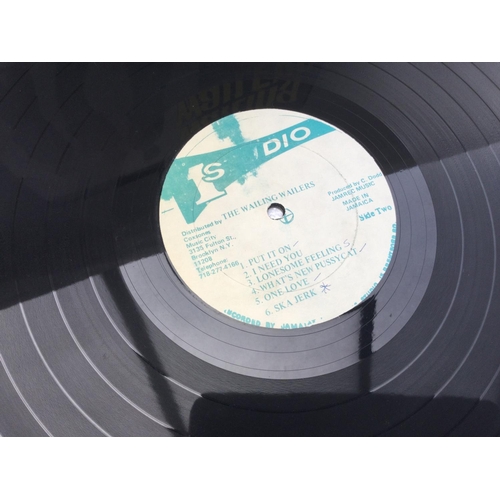 64 - A Jamaican pressing of 'The Wailing Wailers' LP, S1001. Vinyl is VG+.