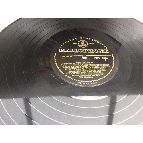 74 - A first UK mono pressing of The Beatles debut LP 'Please Please Me', PMC 1202 with black and gold Pa... 