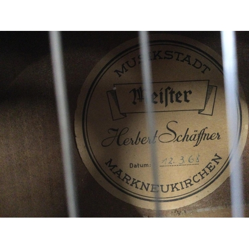 806 - A 1968 Herbert Schaffner acoustic guitar and soft carry case.