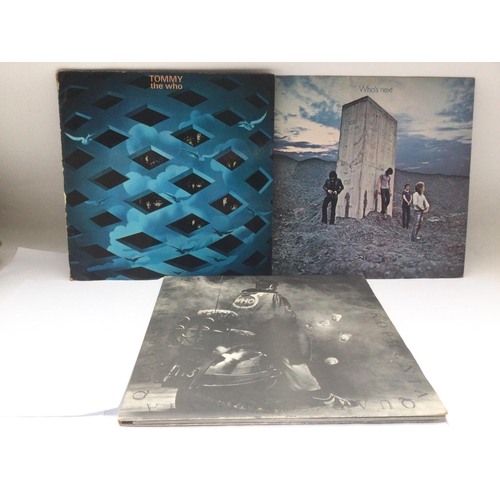 91 - Three LPs by The Who comprising 'Tommy', 'Quadrophenia' and 'Who's Next'.