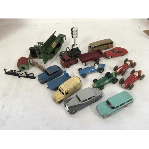 1073 - A collection of Playworn model cars by Dinky and Corgi plus some accessories.