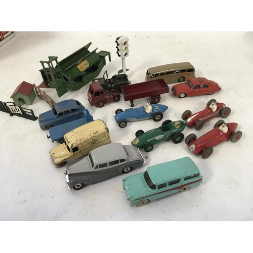 1073 - A collection of Playworn model cars by Dinky and Corgi plus some accessories.