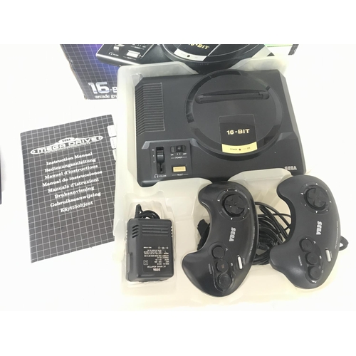 184 - A Boxed Sega Mega Drive with 4 Boxed Games.(2).