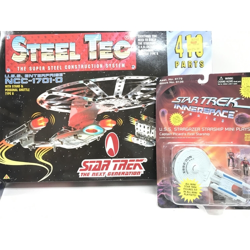 227 - A Collection of Star Trek Toys including Bobble-Heads and a Steel Tec Set.