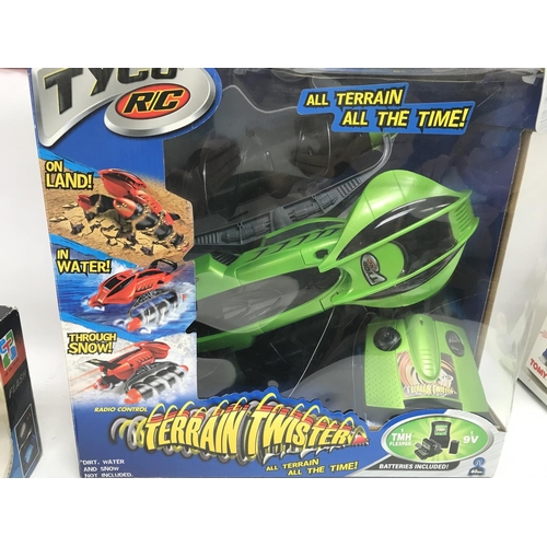 228 - A Boxed Tyco R/C Terrain Twister and a He Tai Toys R/C Mini.(2).