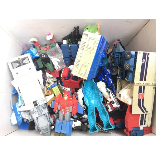 252 - A Box Containing Playworn Transformers etc.
