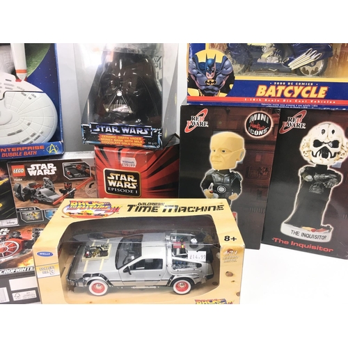 277 - A Box containing Various Film toys Etc. Including Back to The Future. Star Wars Lego. Red Dwarf.Saw ... 