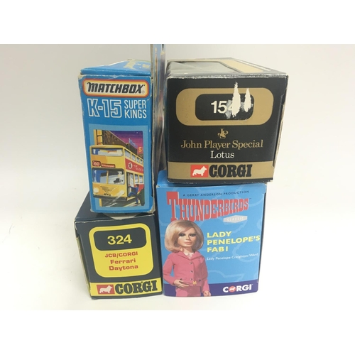 300 - A Boxed Matchbox Berlin Bus #K-15. A Corgi Lotus #154. A Corgi Ferrari Daytona #365. And a Corgi Cla... 