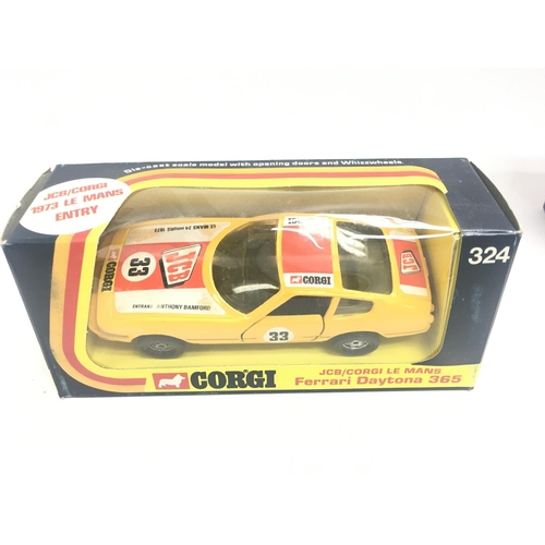 300 - A Boxed Matchbox Berlin Bus #K-15. A Corgi Lotus #154. A Corgi Ferrari Daytona #365. And a Corgi Cla... 
