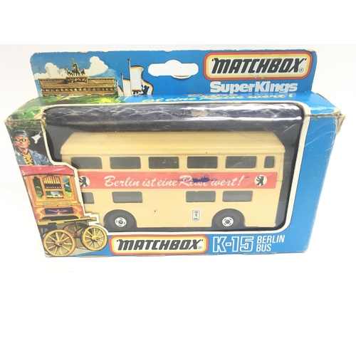 300 - A Boxed Matchbox Berlin Bus #K-15. A Corgi Lotus #154. A Corgi Ferrari Daytona #365. And a Corgi Cla... 