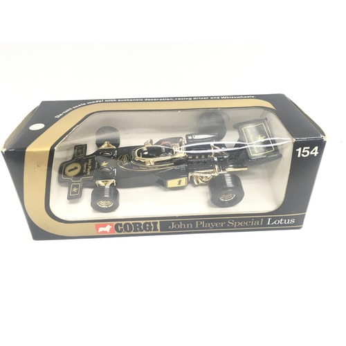 300 - A Boxed Matchbox Berlin Bus #K-15. A Corgi Lotus #154. A Corgi Ferrari Daytona #365. And a Corgi Cla... 
