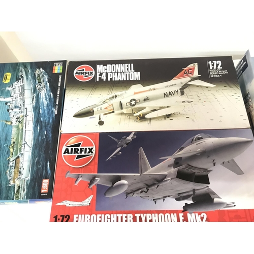 84 - A Box Containing Airfix. Matchbox Model Kits. all Un Built.