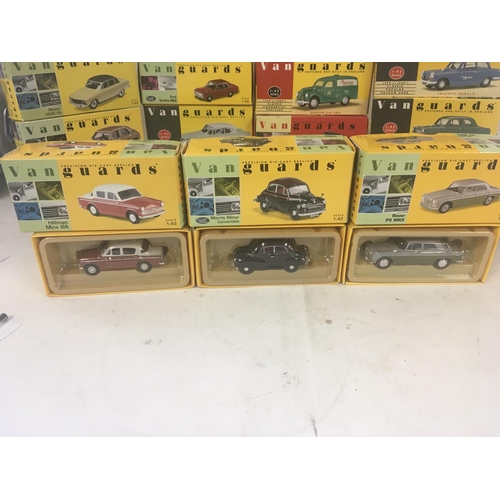 842 - A collection of 24 boxed model cars by Vanguards. Scale 1..43