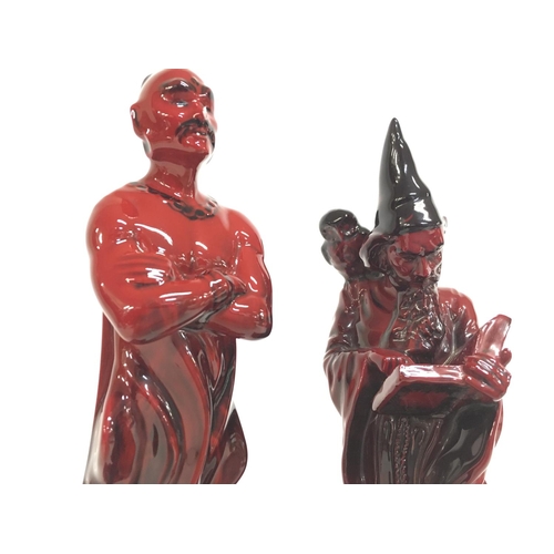 1008 - A pair of Royal Doulton porcelain Flambe figurines including The Genie HN 2999 & The Wizard HN 3121.... 