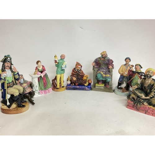 1010 - A collection of Royal Doulton figures including The Pirate King HN 2901, Mendieant HN 1365, The Foam... 