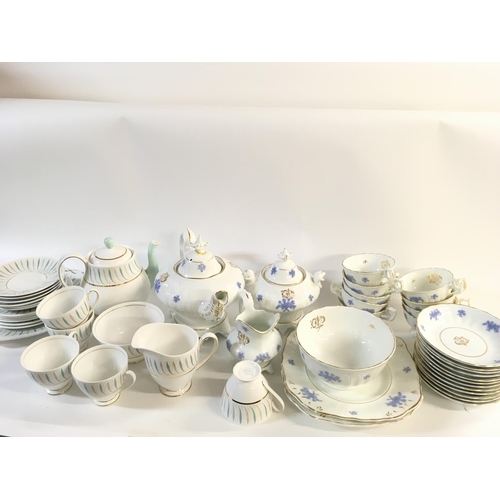 1015 - A collection of part tea sets including Queen Anne with caprice design. Postage D