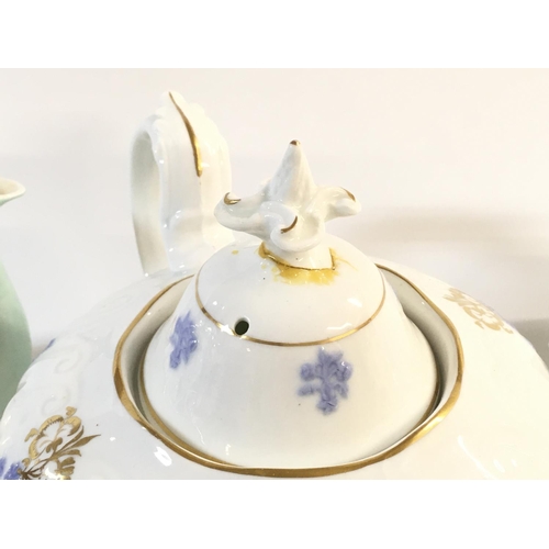 1015 - A collection of part tea sets including Queen Anne with caprice design. Postage D