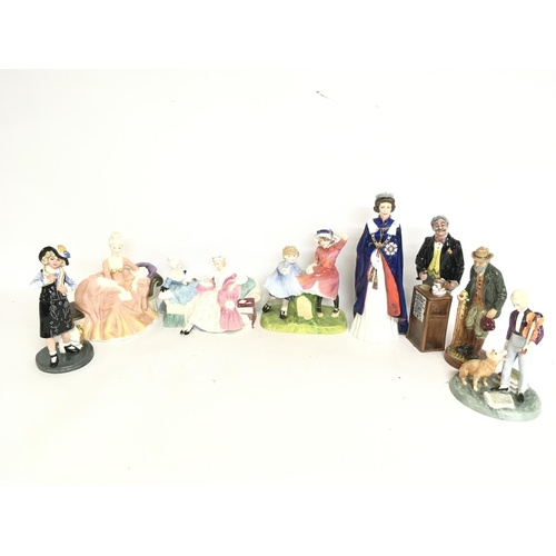 1022 - A collection of Royal Doulton figures including The Gaffer, The Young Master, Pearly Girl, Reverie, ... 