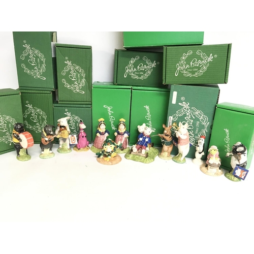 1023 - A collection of boxed John Beswick porcelain figures including Sage the Owl, Washerwoman Toad, Droop... 