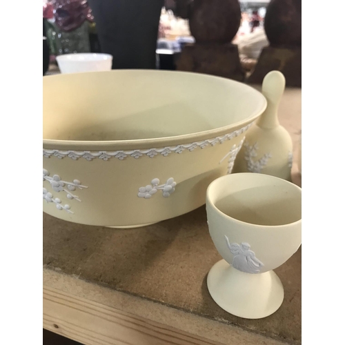 1046 - A Collection of lemon wedgewood including jar and cover bowls vases cups and saucers