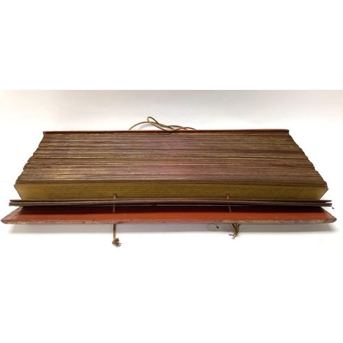 1114 - An Early 20thC palm leaf scripture with lacquered wooden covers, written in Tamil, Possibly Sri Lank... 