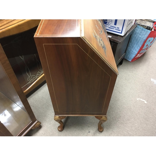 1265 - A lacquer bureau with oriental style artwork. 76w x 102h x 42d (cm)