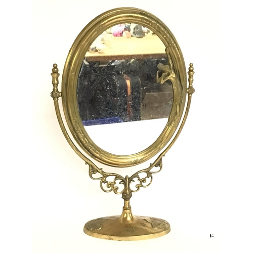 1276 - An Art Nouveau style mirror , 49cm tall. postage cat D