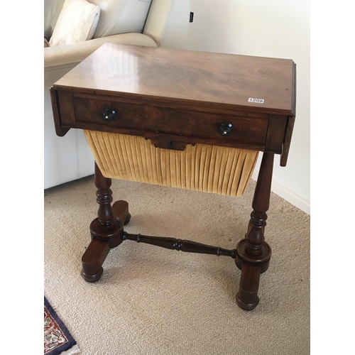 1284 - A Quality Early Victorian mahogany free standing work box with a drawer and sliding wool box and twi... 