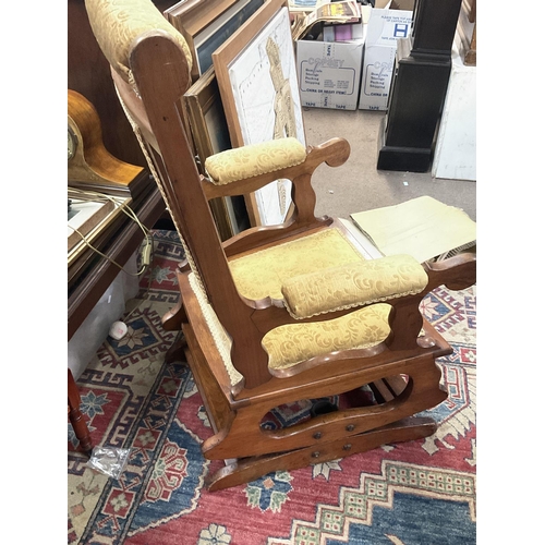 1357 - Oak Rocking chair with yellow floral patterned upholstery 56x56cm x height 100cm. Postage category D