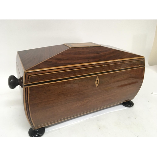 1360 - A Quality Early 19th century Rosewood and satinwood tea caddy with a well fitted interior with two c... 