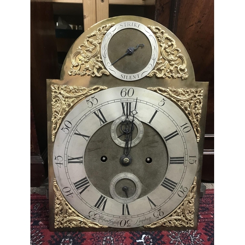 1376 - A mahogany long case clock case together with two movements- brass dial and silver dial- Mich Padbur... 