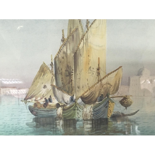 1520 - A gilt framed watercolour study of Venice with traditional fishing sailing boats. With inscription a... 