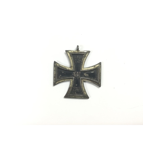 1671 - A German Imperial iron cross. Shipping category A.