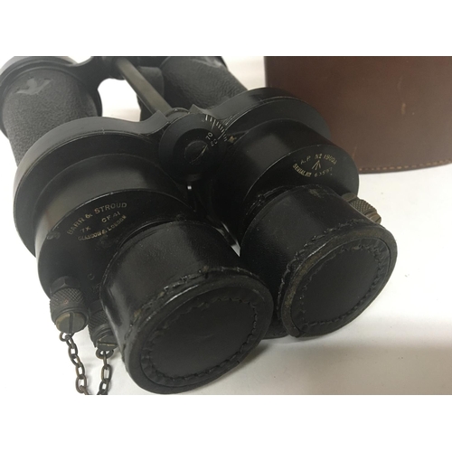 1684 - A pair of military binoculars in a leather fitted case maker Barr & Stroud.