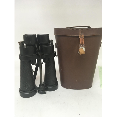 1684 - A pair of military binoculars in a leather fitted case maker Barr & Stroud.