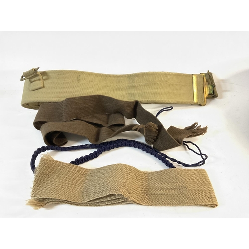 1692 - Second World War royal west Kent hats with belts and cloth badges. Also cigarette case and various p... 