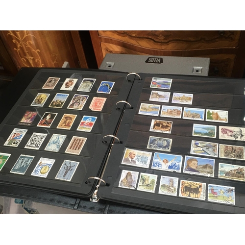 1793 - A large collection of mixed world stamp albums , postage category D