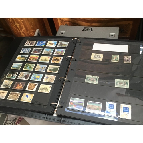 1793 - A large collection of mixed world stamp albums , postage category D