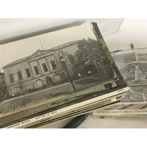 1889 - A box containing a collection of mixed postcards and smal, postcard albums (a lot)