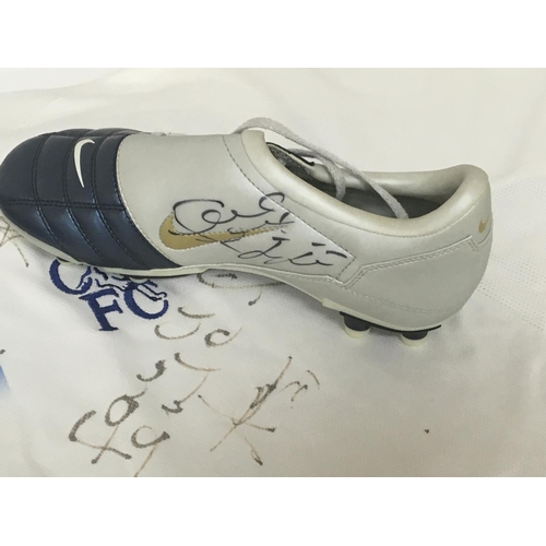 1900 - An official signed Chelsea football shirt and a football boot signed by John Terry (2)